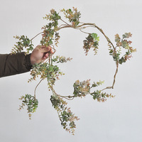 Guirlande artificielle en eucalyptus en plastique de 160 cm de long, vigne verte pour les arrangements de Noël, les mariages et la décoration des centres commerciaux