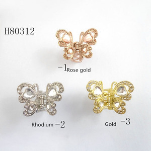 Factory wholesale colorful metal butterfly hair <b>clips</b>, fashionable, hollowed-out, exquisite, small and cute <b>bow</b> decorative hair - Product Image 1
