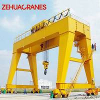 Nouvelle Grue Portique à Double Poutre Lourde MG 2026 Montée sur Rail 10T-100T avec Crochets Principal et Auxiliaire, VFD Complet, FEM, CE, ISO, Moteur, Roulement