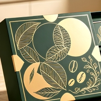 Boîte cadeau de café personnalisée haut de gamme faite à la main avec gaufrage, design rigide à rabat en papier, doublure en éponge et insert compartimenté pour boîtes de café