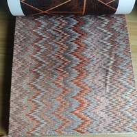Rideaux textiles de maison de luxe Tissu d'ameublement intérieur rouge-orange et tissu de draperie avec motif de fil d'or argenté