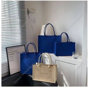 Vente en gros de sacs fourre-tout écologiques en feutre coloré de grande capacité avec logo personnalisé et motif léopard sac d'épicerie personnalisé bricolage - Product Image 1