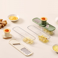 Gadget de cuisine manuel trois-en-un pour hacher, trancher et râper le gingembre et l'ail, personnalisation d'usine