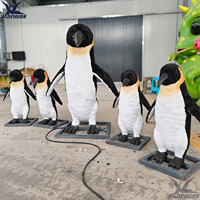 Statue d'animal animée grandeur nature véritable pingouin animatronique pour la décoration de parc animalier océanique