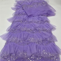 Nouveau style de tissu en maille africaine à volants et broderies en dentelle avec perles et paillettes faites à la main pour vêtements en polyester