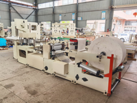 Machine de fabrication de papier bavoir dentaire jetable