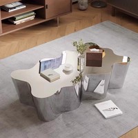 Leichter Luxus Einfacher fließender Wasser-Anzeige tisch Kreativer, speziell geformter Edelstahl-Couch tisch für Hotel-Wohnzimmer-Tee