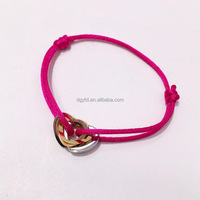 Bijoux de cœur pour femme en acier inoxydable plaqué or 18 carats breloque de cœur à emboîtement cordon en satin bracelet tressé fabricant de bijoux