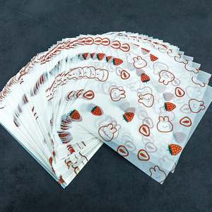 Papier ciré alimentaire jetable biodégradable imperméable et résistant à la graisse 18*18CM pour emballer gâteaux, sandwichs et burgers - Product Image 1