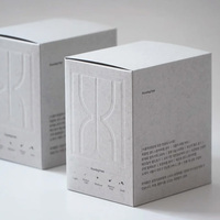 Boîte en papier d'emballage personnalisée, design luxueux et élégant, boîte en papier d'emballage pour café gris avec impression de logo en relief
