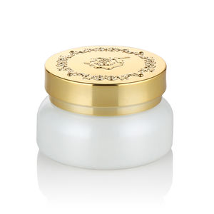 Envase cosmético dorado de último estilo 30g 50g Tarro de cristal de crema facial con tapa dorada en relieve - Product Image 1