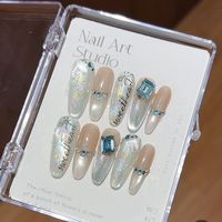 Nouvelle Arrivée : Faux Ongles à Presser en Acrylique Amande Faits Main, Style Coquillage Océanique Estival, avec Paillettes Brillantes et Nœud Noir, en Gel