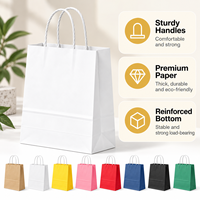 Sacs en papier kraft personnalisés avec votre propre logo, sacs cadeaux avec poignées pour l'emballage de vêtements en vente au détail