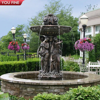 Fontaine d'eau en marbre de jardin d'extérieur avec sculpture d'oiseau en bronze