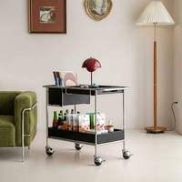 Table basse de style mi-siècle avec plateau solide, chariot de rangement mobile, structure métallique robuste, étagère de présentation portable, idéale pour appartement