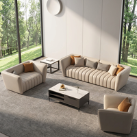 Ensemble de canapés de bureau côtelés crème, mobilier de salon chic pour espaces ouverts avec design vue sur verdure naturelle fraîche