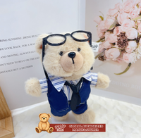 Peluche Teddy ISLAND, jouet en peluche pour entreprise, avec cravate à carreaux noirs et blancs et chemise grise