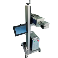 Machine de marquage au laser pour la date d'expiration des sacs en plastique, machine de codage au laser pour les logos de marque sur les boîtes en carton ondulé