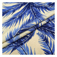 Tela de viscosa tejida con motivos de hojas tropicales, tela suave y fluida para blusas y faldas de verano, tela de rayón estampada con hojas al por mayor.