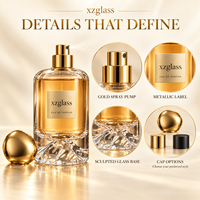 Flacon de parfum cylindrique de luxe en verre avec base sculptée en forme de montagne, bouchon en galet doré, sérigraphie, 30ml 50ml 100ml pour parfum