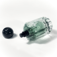 Bouteille d'atomiseur d'huile essentielle de cylindre de forme plate transparente transparente de 100ml avec le chapeau sphérique pour l'emballage d'épices de jet de brouillard