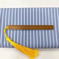 2025 nouveau Stock Lot bleu clair rayure popeline tissu écologique teint en fil coton Nylon mélangé Spandex tissé pour garçons chemise unie