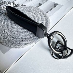 Porte-clés créatif en PU pour voiture, personnalisable avec logo imprimé, anneau de clés en fourrure, cordon de ceinture, pendentif pour cadeaux originaux – Vente en gros - Product Image 6