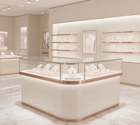 Comptoir de présentation de bijoux de luxe de haute qualité, vitrine en verre crème or rose à coins arrondis avec éclairage LED pour magasin de détail