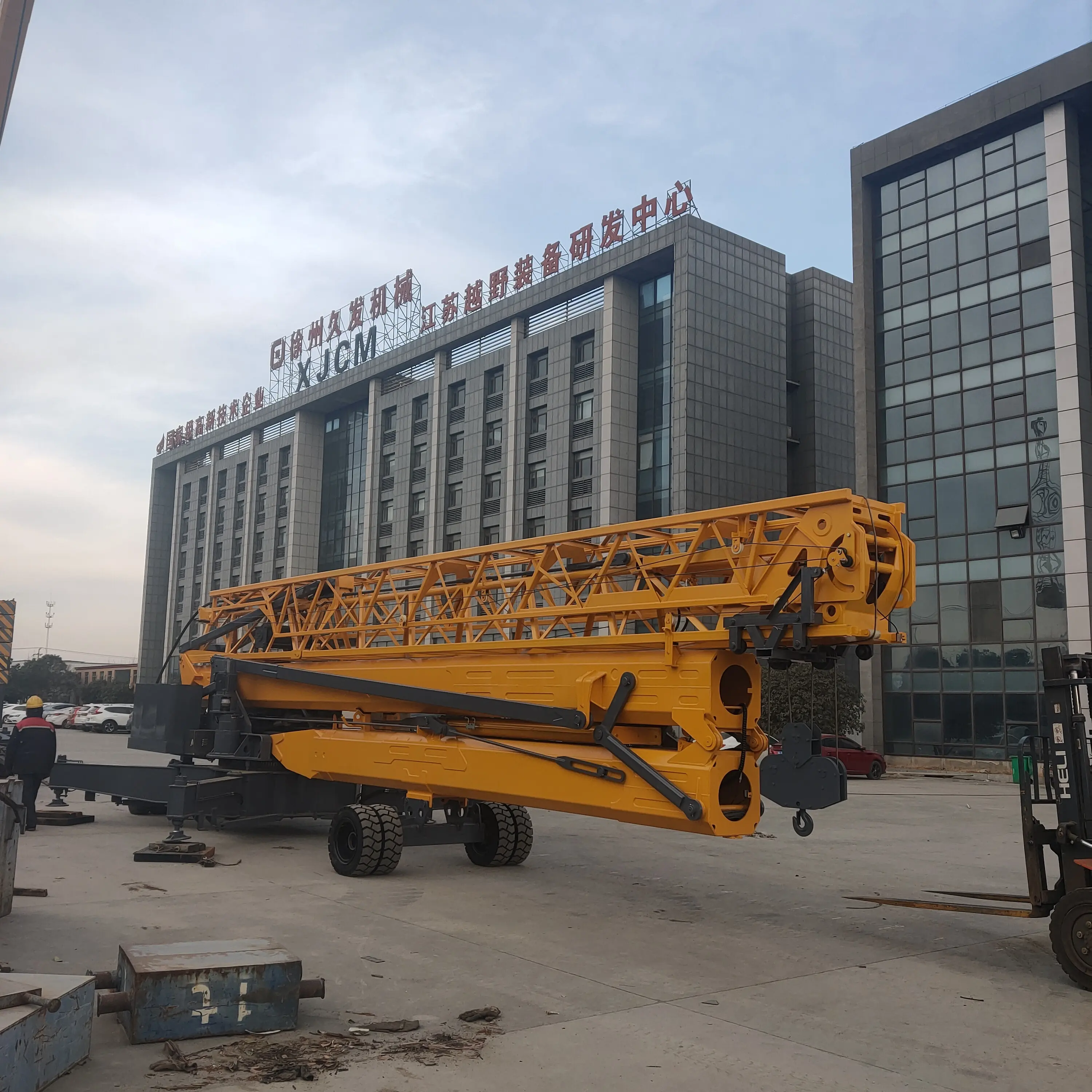 Xuzhou XJCM 4 ตันขนาดเล็กสร้างตนเองมินิตาวเวอร์เครนสําหรับขายให้ jiufa ทาวเวอร์เครนราคาสีเหลืองก่อสร้าง 4.2*4.2m