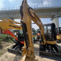 Mini-pelleuse Caterpillar 303.5 d'occasion à faible nombre d'heures de fonctionnement, 3,5t, hydraulique, avec chenilles en caoutchouc durables pour la ferme