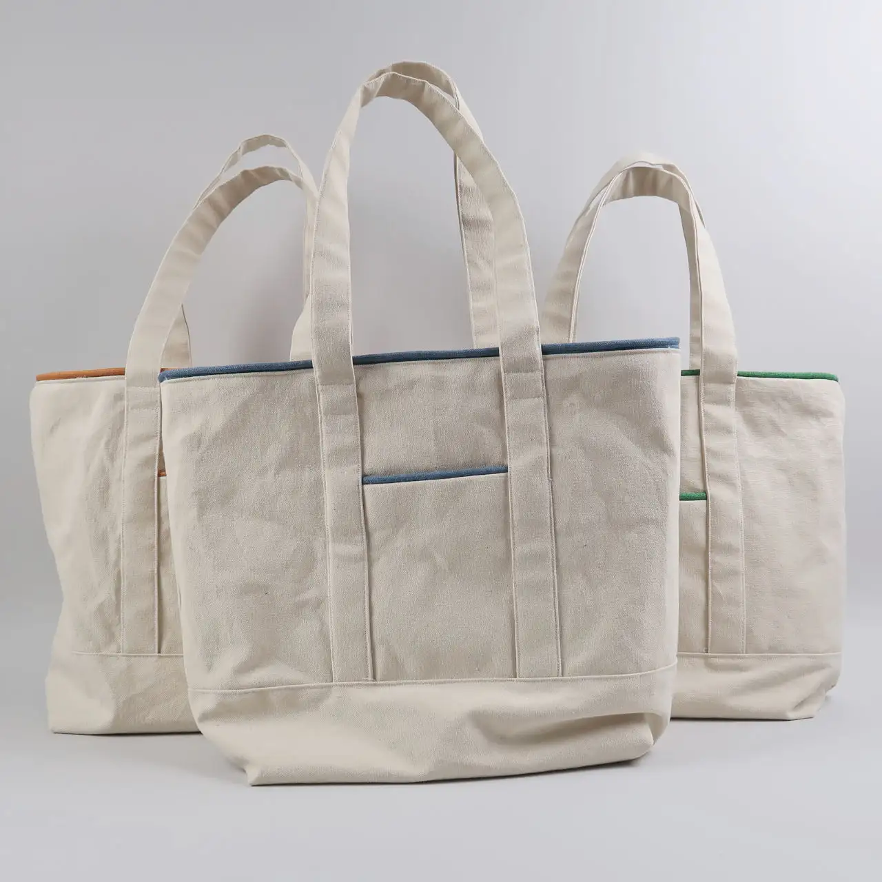 Cetak kustom tas jinjing katun kualitas tinggi tas Tote kanvas buatan tangan dengan pipa dan kantong