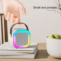 2 en 1 Fashion K12 Kid Toy Mini Portable Outdoor KTV Home Party Karaoke Player Wireless Speaker with Microphone for Children