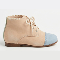 Chaussure habillée élégante pour femme, en cuir souple, pour tenue de ville, de soirée ou quotidienne, style Derby ou botte.