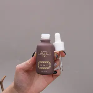 Most Popular Personal Care Oil Serum High Quality Porcelain Dropper Bottle White Glass And 100g Amber Frosted Cosmetic Glass Jar