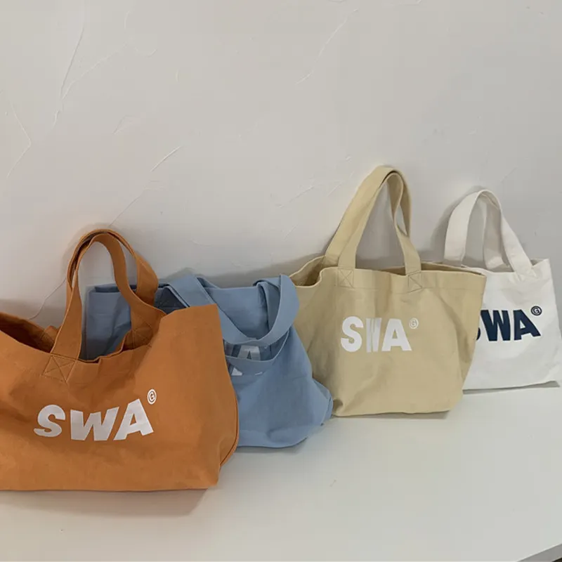 Nueva tendencia de moda, bolsa de compras de lona informal reutilizable, bolsas de lona de algodón lavadas de un hombro con logotipo impreso personalizado