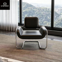 Fauteuil de loisirs vintage en cuir de style mid-century, base en métal chromé, fauteuil rembourré pour villa et hôtel, espace public