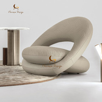 Fauteuil de loisirs en cuir italien de luxe à siège unique, design unique pour salon, salle de lecture, centre commercial, appartement, hôtel