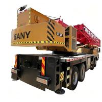 Grue SANY STC1000 d'occasion pour charges lourdes, grue sur camion SANY de 100 tonnes, équipement de levage haute capacité pour l'installation d'éoliennes