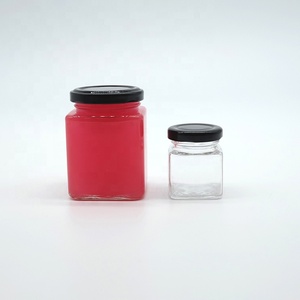 Bouteille en verre carrée pour vente en gros, idéale pour les cornichons au miel et au piment, ou comme pot vide scellé avec couvercle, résistant aux hautes températures, pour la sauce au bœuf à quatre nervures. - Product Image 3