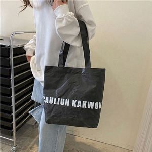 Nouveauté, sac fourre-tout personnalisé à la mode vintage en Tyvek Dupont, grande capacité, pour les trajets quotidiens, sac à main en papier kraft noir pour femmes - Product Image 1
