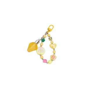 Porte-clés fruit végétarien mignon en plastique brillant à lèvres jouet de beauté et de mode pour filles - Product Image 1