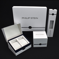 Boîte d'emballage de montre bracelet de marque personnalisée boîtes de montre de luxe avec logo en feuille d'or oreiller en velours peluche noir à lumière LED