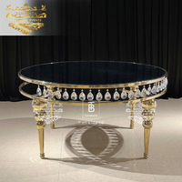Ensemble de table et chaises rondes en verre trempé suspendues avec structure en acier inoxydable moderne et luxueuse, écologique et durable