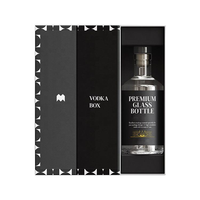 Boîte cadeau personnalisée noire magnétique de style livre avec impression dorée et plateau encastré pour bouteille, idéale pour les cadeaux cosmétiques en gros