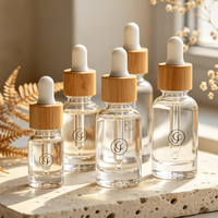 Botol Penetes Kaca Transparan dengan Kerah Bambu untuk Produk Kecantikan Bersih dan Perawatan Kulit Alami