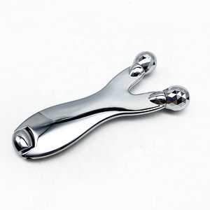 Nuevo Metal Aleación de zinc Multifuncional <span class=keywords><strong>GuaSha</strong></span> Rodillo facial Acupuntura Cuello Masajeador de ojos y dispositivo de raspado de nariz - Product Image 1