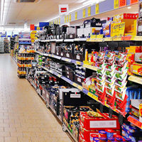 Présentoir de merchandising HOOKEI sur mesure à 12 stations avec pinces métalliques pour sacs de chips et snacks