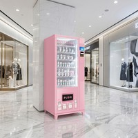 Distributeur automatique de produits capillaires, de soins de la peau, de parfums, de cosmétiques, de cartes beauté et de pièces de monnaie