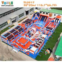 Parc de jeux gonflables commercial Tonle personnalisé pour événements extérieurs et locations de fêtes