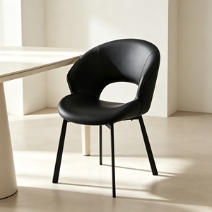 Modern Hollow Cutout PU Leather <b>Dining</b> <b>Chair</b> | Curved Upholstered Accent <b>Chair</b> with Matte <b>Black</b> Metal Legs for <b>Dining</b> Room - Product Image 2